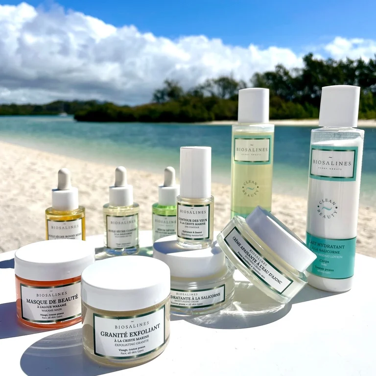 Biosalines skincare products photographed beside a lagoon